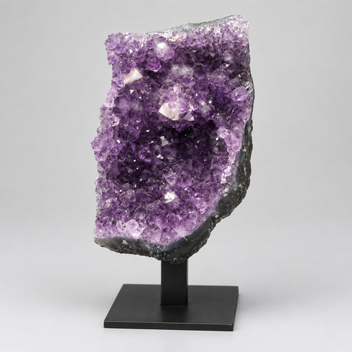 Geode amethyst on black stand