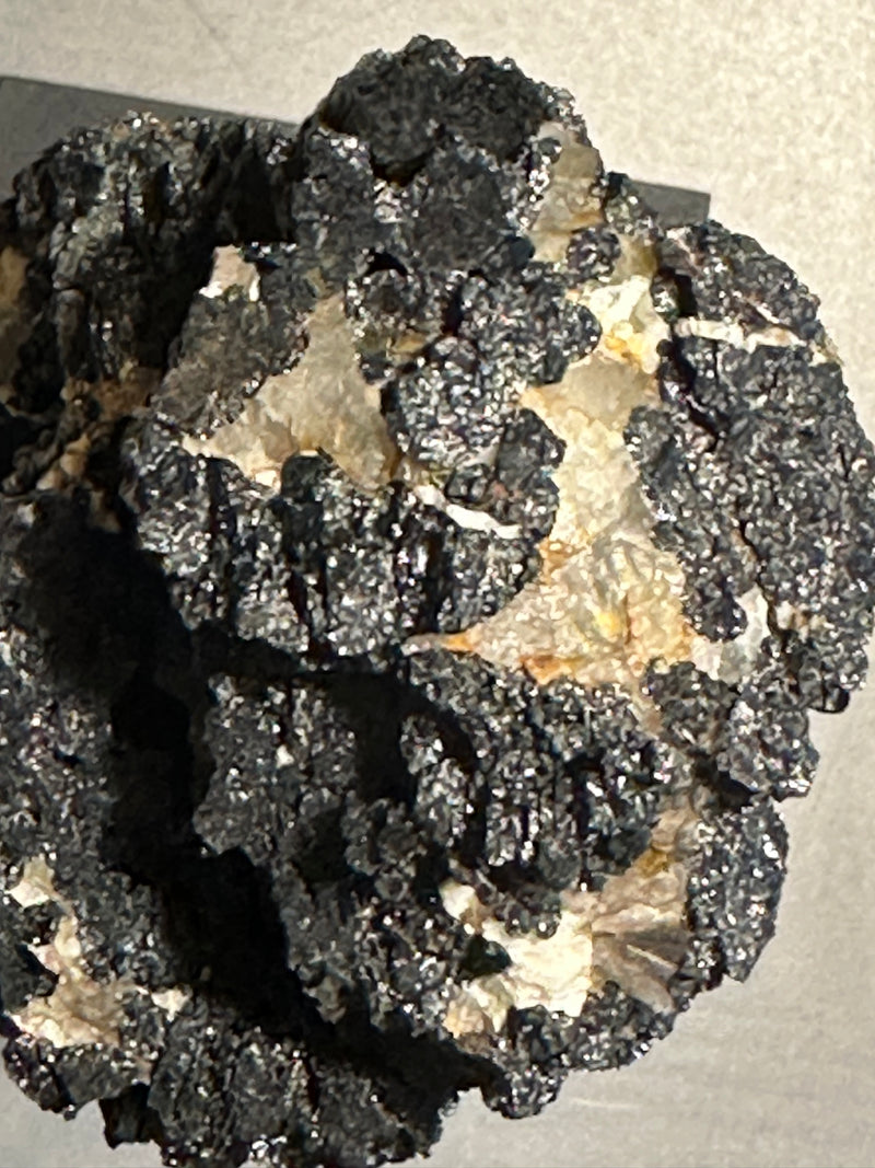 Brazilian Raw Black Tourmaline with Quartz, Calcite and Mica on Hand-Forged Iron Stand