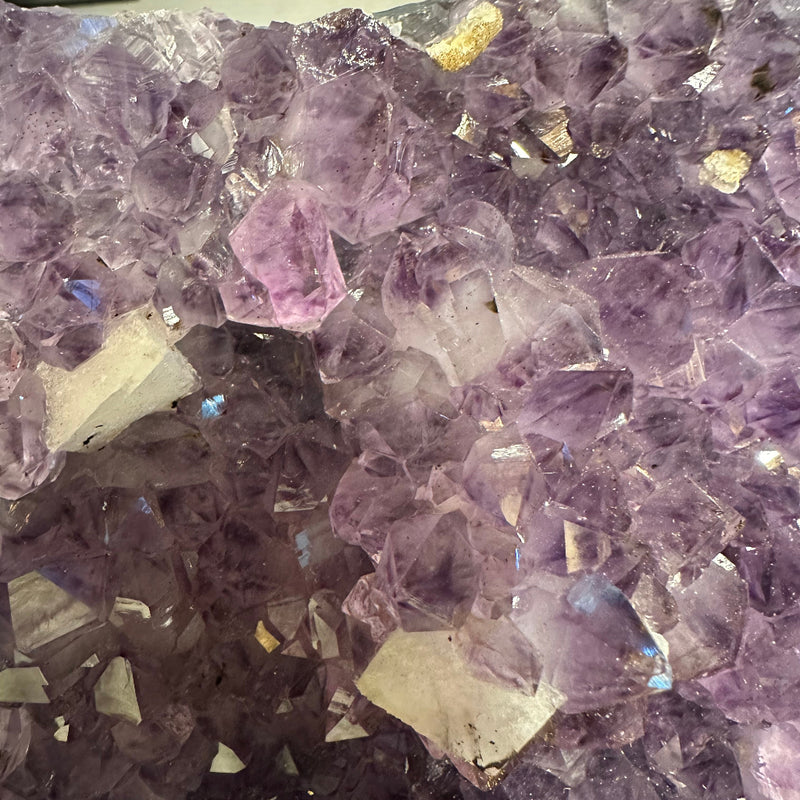 Deep Amethyst Cut Geode with Calcite Accents on Metal Stand