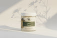 Jar of Botanical Body Butter on a light gary background