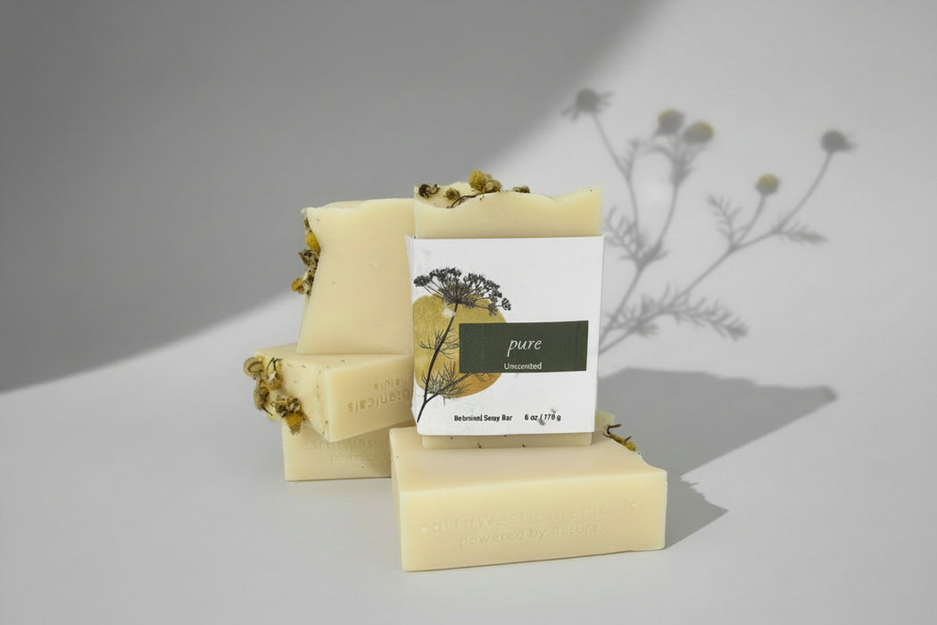 Bars of Pure unscented soap with a label on a gray background