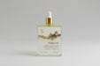 Throat Body  Oil dropper bottle with label on light gray background