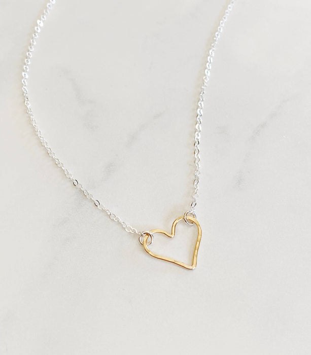 Mixed metal open heart necklace